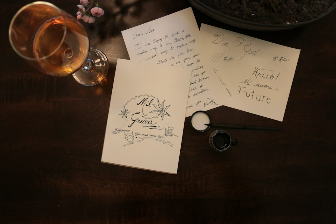Handwritten notes and a pen on paper