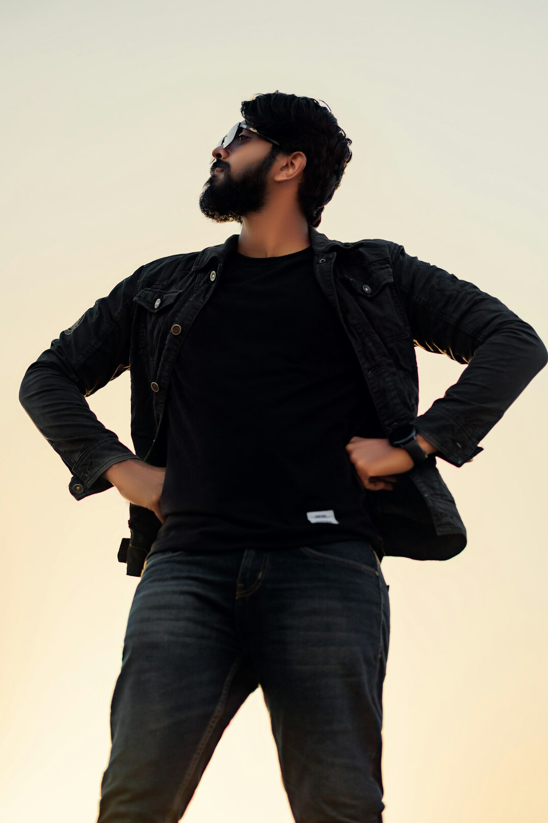 Portrait of a bearded man with a neutral background